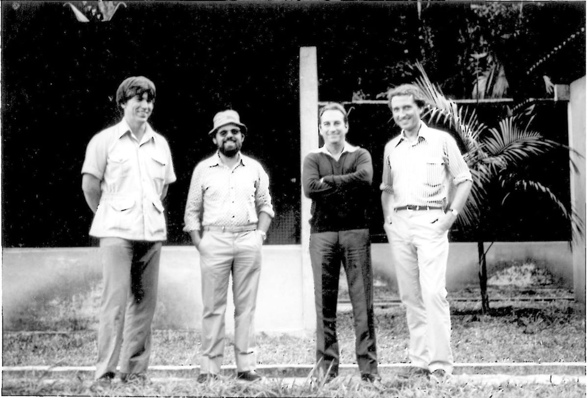 Tom Lovejoy in the Rio de Janeiro Primate Center, ca. 1980.  From left, Russ Mittermeier, Celio Valle, Adelmar F. Coimba-Filho (founder of the Center) and Tom.